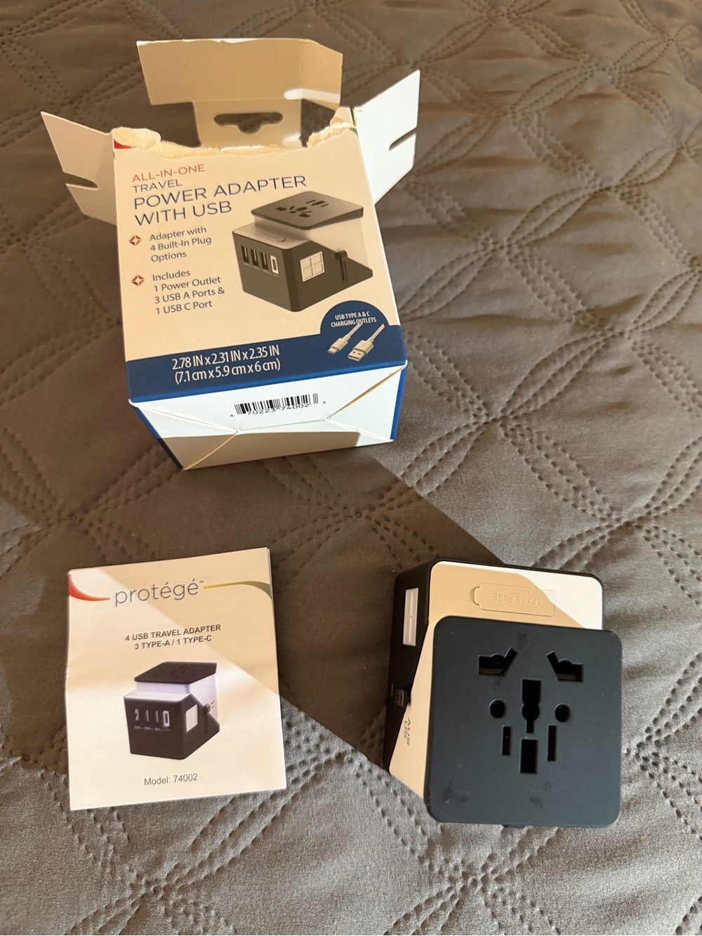 Protegé Black All‑in‑One Travel Power Adapter with USB-A and USB-C